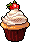 chocolate cupcake with white frosting and a cherry