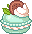 mint macaron with white cream and chocolate candy