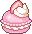 strawberry macaron with white cream and a strawberry slice