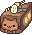nyanko cat in a slice of chocolate banana cake
